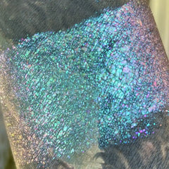 Mermagic swatch over black base | Surreal Makeup