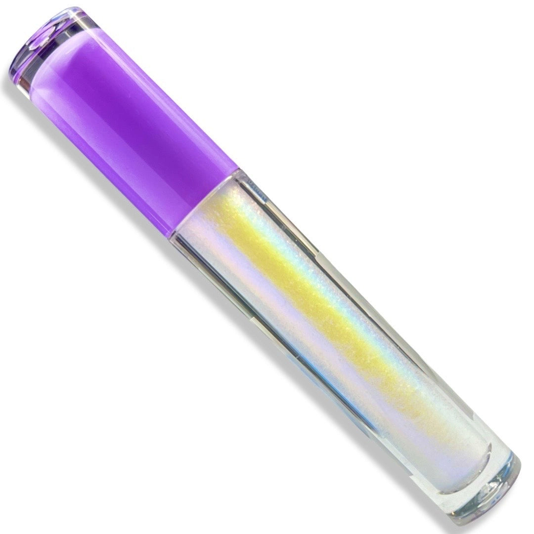 A tube of holographic lip gloss with a translucent purple cap, showing a shimmering iridescent blue and yellow gloss inside a clear container on a white background.